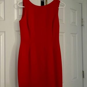 Red flattering sleeveless dress.